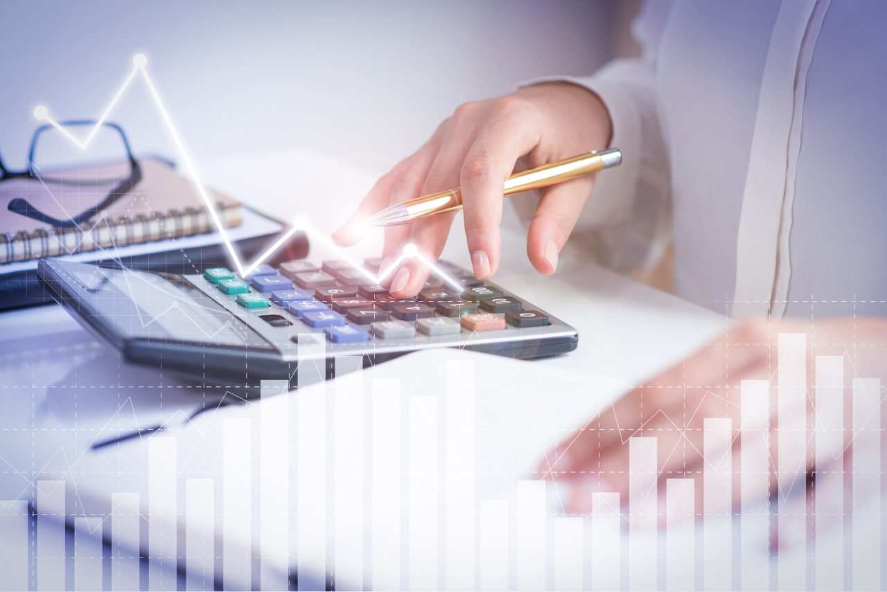 accountant-calculating-profit-with-financial-analysis-graphs-1-1280x855.jpg